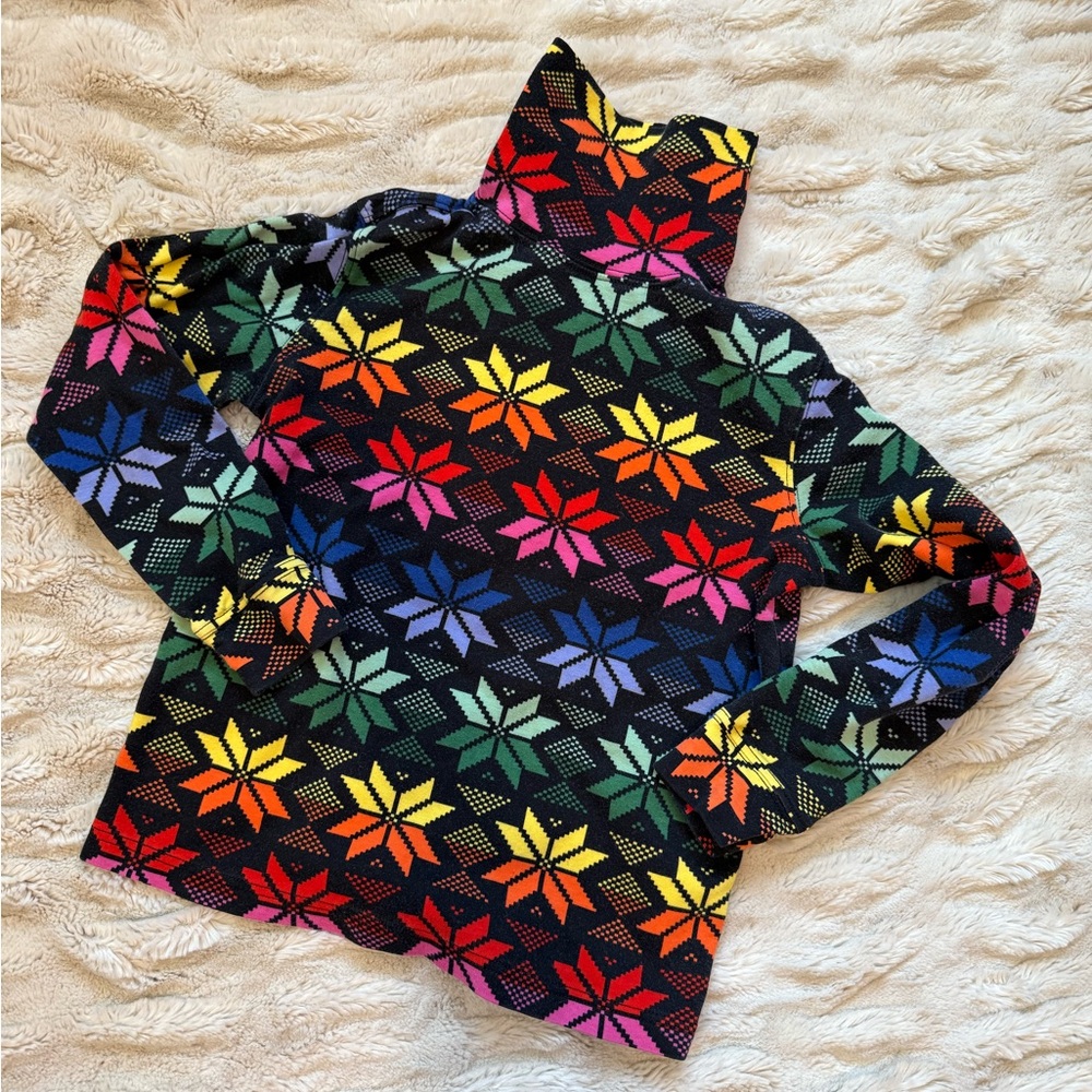 Rainbow Nordic style turtleneck by Hanna Andersson. ⭐️🌈